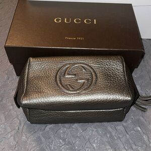 Preloved Gucci metallic grey cosmetics travel bag small excellent condition.